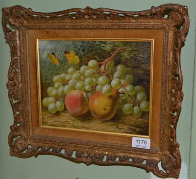 Lot 1178 - H * Major (Late 19th century) A still life of a pear, apples, grapes and butterflies on a mossy...