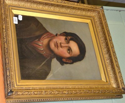 Lot 1181 - A portrait of a young man, oil on canvas, framed and glazed