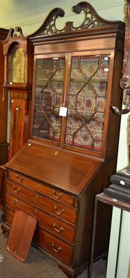 Lot 1194 - # George III mahogany bureau bookcase