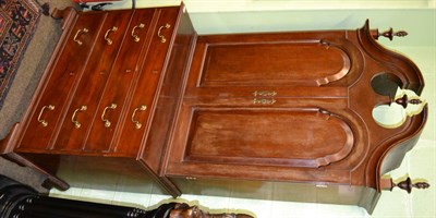 Lot 1209 - Mahogany bookcase/chest, the moulded pediment with three spiral turned urns above cupboard...