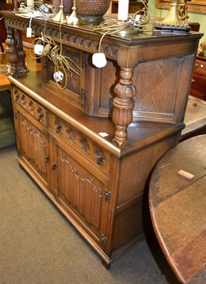 Lot 1231 - Reproduction carved oak court cupboard