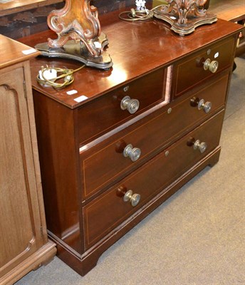 Lot 1237 - * A mahogany four drawer straight fronted chest of drawers stamped ";D & H Waddington, Bolton"