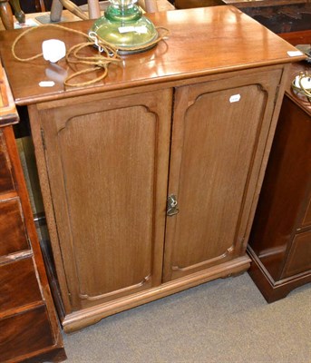 Lot 1239 - An Edwardian walnut double door cabinet