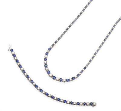 Lot 356 - A Sapphire and Diamond Necklace and Bracelet Set, the necklace comprising a graduated line of...