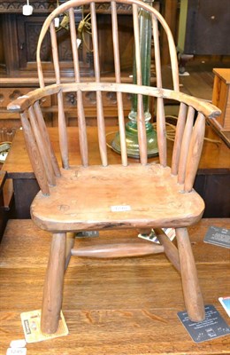 Lot 1248 - Child's yewwood spindle back armchair