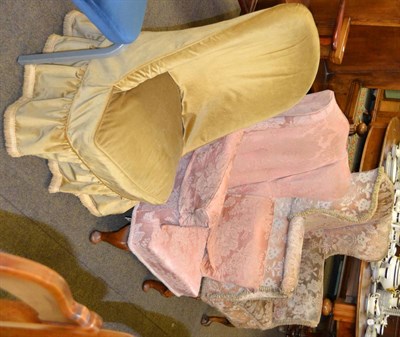 Lot 1279 - Two early 20th century wing back chairs and a 19th century nursing chair with velvet loose cushion