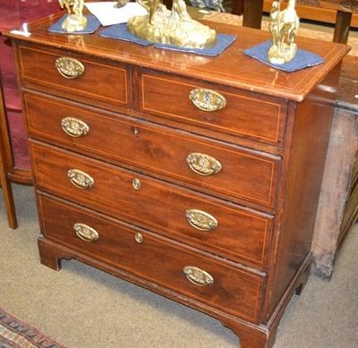 Lot 1300 - A 19th century mahogany inlaid four height chest of drawers