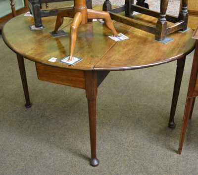 Lot 1303 - # George III mahogany pad foot table