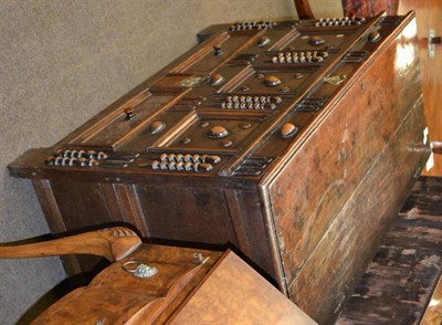 Lot 1308 - A late 17th century joined oak chest with applied mounts