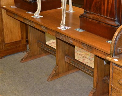 Lot 1312 - Oak Gothic style dining table of recent date