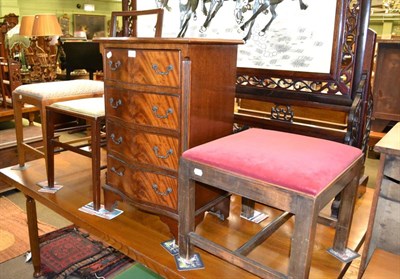 Lot 1324 - Reproduction mahogany four drawer chest, two stools, a bedroom chair and a carved table