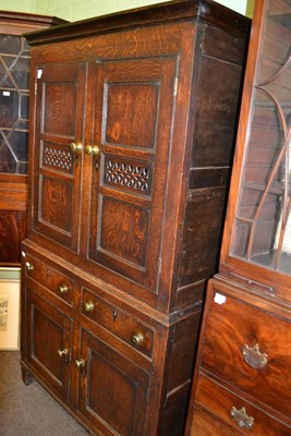 Lot 1333 - An 18th century oak food cupboard