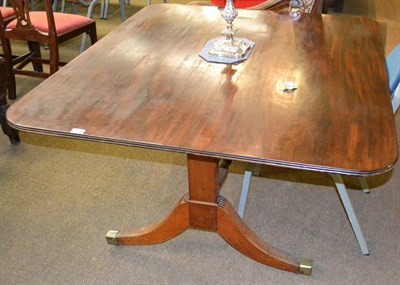 Lot 1342 - George III mahogany fliptop dining table, 18th century and adapted, of rounded rectangular...