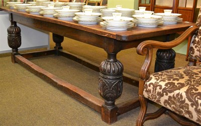 Lot 1346 - Elizabethan style joined oak refectory table, of four-plank construction with cleated ends,...