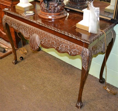 Lot 1349 - Irish carved mahogany serving table (Hicks)