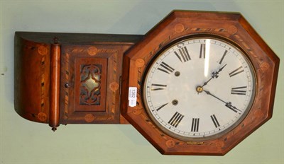 Lot 1362 - An inlaid striking wall clock