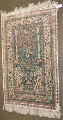 Lot 1363 - Finely Woven Chinese silk prayer rug, the aquamarine field with birds and flowering plants...