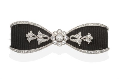 Lot 371 - A Diamond and Silk Bow Brooch, a central cluster of old cut and rose cut diamonds in milgrain...