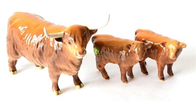 Lot 13 - Beswick Cattle: Highland Cow, model No. 1740; Highland Calf, model No. 1827D; and another calf...