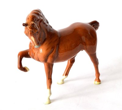 Lot 23 - Beswick Horse (Head Tucked, Leg Up), model No. 1549, version one, chestnut gloss