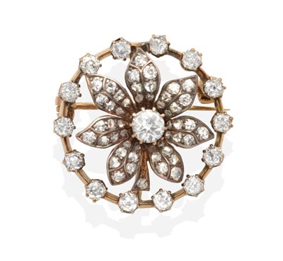 Lot 382 - A Diamond Flower Brooch/Pendant, a central old cut diamond to diamond inset petals and within...