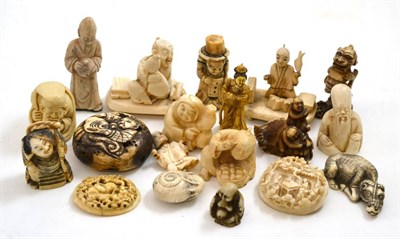 Lot 142 - Two Cantonese carved ivory brooches and a collection of ivory netsukes circa 1920/30, and a...