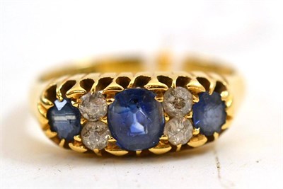 Lot 163 - An 18ct gold sapphire and diamond ring