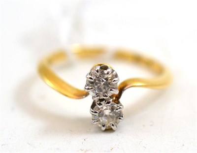 Lot 170 - A diamond two stone ring, stamped ";18CT";, total estimated diamond weight 0.40 carat approximately