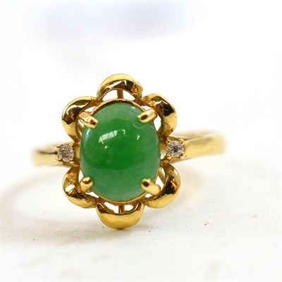 Lot 172 - A jade and diamond ring, shank stamped ";14K"; and ";585"
