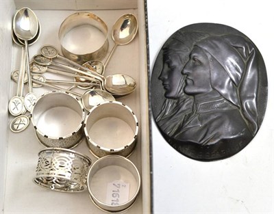 Lot 174 - Five silver napkin rings, silver teaspoons and an embossed portrait plaque