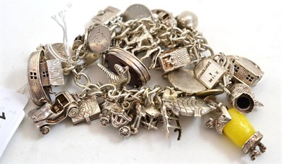 Lot 183 - A silver charm bracelet