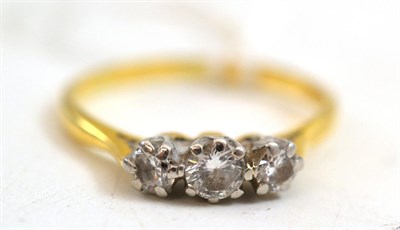 Lot 186 - A diamond three stone ring