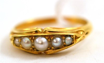 Lot 187 - An 18ct gold split pearl ring