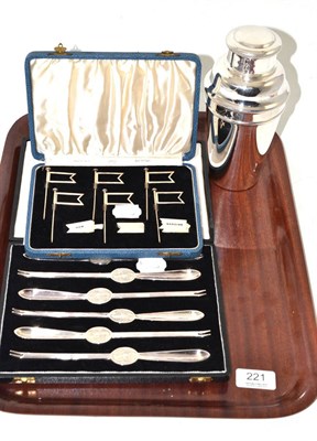 Lot 221 - A set of six silver sandwich makers with ivorine plaques, a silver plated cocktail shaker and a set