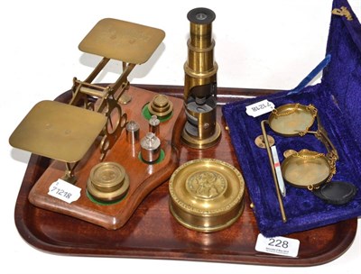 Lot 228 - Brass postal scales, pair of cased scales, brass box and a student's microscope