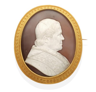 Lot 398 - A Finely Carved Mid-Nineteenth Century Shell Cameo Brooch, depicting the bust of Pope Pius IX, in a