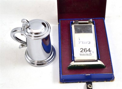 Lot 264 - A Dunhill table lighter in fitted case and another Dunhill lighter in the form of a tankard (2)