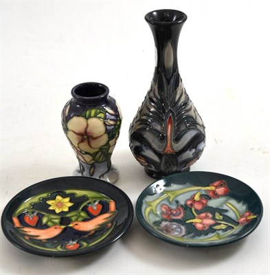 Lot 275 - Moorcroft vase, two Moorcroft dishes (seconds) and another Moorcroft vase (second)