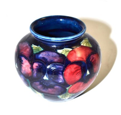 Lot 279 - Moorcroft blue ground 'Pansy' vase