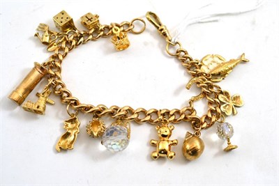 Lot 297 - A charm bracelet with 9ct gold charms, each curb link stamped '375'