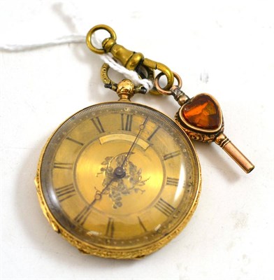 Lot 304 - A lady's fob watch, case stamped 18k, with attached watch key