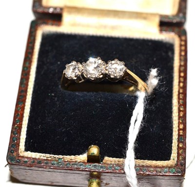 Lot 319 - A three stone diamond ring