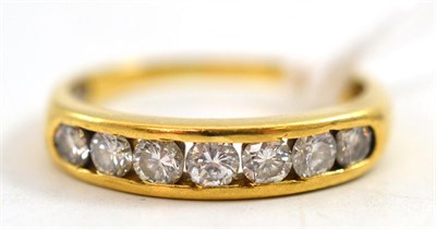 Lot 321 - An 18ct gold half eternity diamond set ring