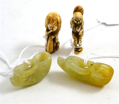 Lot 338 - A pair of Chinese jade opium measures, of anthropomorphic form, 5.5cm long; and two early 20th...