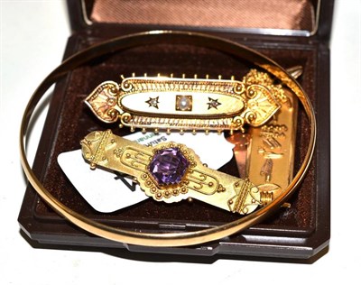 Lot 344 - A 9ct gold bangle, pendant, two gold brooches stamped '375', '625', pendant cross stamped '9CT'...