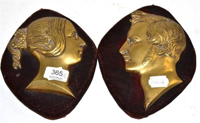 Lot 365 - Two Victorian brass plaques depicting Queen Victoria and Prince Albert, circa 1850