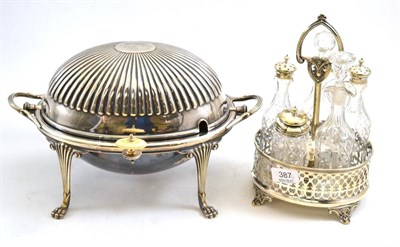 Lot 387 - A silver plated cruet and a plated serving tureen (2)