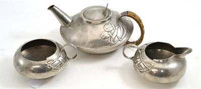 Lot 396 - Liberty Tudric pewter three piece tea service