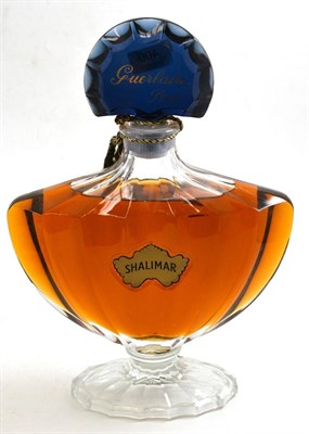 Lot 400 - A Guerlain Paris Shalimar Store display perfume bottle, cobalt glass stopper, marked in gilt...