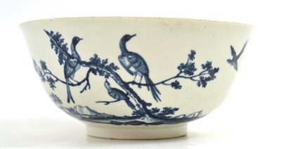 Lot 405 - A First Period Worcester porcelain slop bowl, circa 1760, painted underglaze blue with birds...